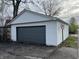 View of detached garage with siding to match house at 17 W Washington St, Mooresville, IN 46158