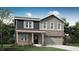 Charming two-story home with a mix of brick and siding, complemented by a well-manicured lawn and mature trees at 2138 Foothill Dr, Greenfield, IN 46140