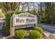 Muir Woods community sign nestled among the trees, offering a serene and welcoming entrance at 2236 Calaveras Way, Indianapolis, IN 46240
