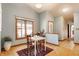 Dining area with a table set for four, near a large window overlooking the yard at 2236 Calaveras Way, Indianapolis, IN 46240