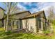 Attractive home exterior featuring neutral siding, a bay window, and a well-manicured lawn at 2236 Calaveras Way, Indianapolis, IN 46240
