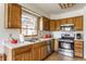 Functional kitchen with stainless steel appliances and ample cabinet storage at 2236 Calaveras Way, Indianapolis, IN 46240