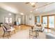 Open-concept living room with a dining area, neutral décor, and ample natural light at 2236 Calaveras Way, Indianapolis, IN 46240