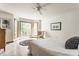 Bright bedroom with large windows and a bay window overlooking the outdoor scenery at 2236 Calaveras Way, Indianapolis, IN 46240