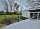 Expansive backyard features a well-maintained lawn and mature trees at 2405 Sycamore St, Columbus, IN 47201