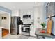 Well-equipped kitchen with modern appliances, sleek cabinetry, and ample countertop space at 2512 E 57Th St, Indianapolis, IN 46220