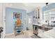 Charming kitchen with stainless steel appliances, ample counter space, and stylish fixtures at 2512 E 57Th St, Indianapolis, IN 46220