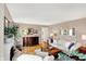 Bright living room showcasing hardwood flooring, tasteful decor, and ample seating at 2512 E 57Th St, Indianapolis, IN 46220