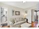 Comfortable living room featuring hardwood floors, natural light, and an open floor plan at 2512 E 57Th St, Indianapolis, IN 46220