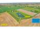 An aerial view showcases a 13.31-acre estate, with an additional 10.01-acre lot next door available at 2575 W 100 S, Franklin, IN 46131