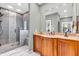 Bathroom featuring a glass enclosed shower with gray tiling and a wood vanity with marble countertop at 2575 W 100 S, Franklin, IN 46131