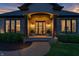 Inviting front entrance with brickwork, modern lighting fixtures, and glass front door at 2575 W 100 S, Franklin, IN 46131