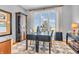 Bright office space with a glass desk, comfortable seating, and large window providing natural light at 2575 W 100 S, Franklin, IN 46131