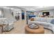 Open concept living room with a staircase, kitchen access, and comfortable seating at 2575 W 100 S, Franklin, IN 46131