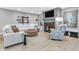 Inviting living room with a fireplace, modern decor, and comfortable seating arrangement at 2575 W 100 S, Franklin, IN 46131