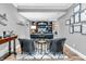 Sophisticated home office with a built-in bookcase and comfortable seating area at 2575 W 100 S, Franklin, IN 46131