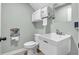Practical powder room featuring a corner sink and toilet in neutral tones at 2575 W 100 S, Franklin, IN 46131