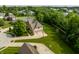 Aerial view of a home featuring a well-manicured lawn, driveway, and basketball hoop at 269 Manchester Ct, Noblesville, IN 46060