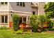Back deck with wood railing, patio furniture, and a lush green yard beyond at 269 Manchester Ct, Noblesville, IN 46060