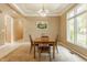 Formal dining room showcasing elegant lighting, neutral decor, and a large window for plenty of sunlight at 269 Manchester Ct, Noblesville, IN 46060