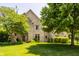 Charming brick home with a well-maintained lawn and mature trees offering curb appeal at 269 Manchester Ct, Noblesville, IN 46060