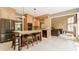 Open kitchen with a center island, custom cabinets, and easy access to the living room at 269 Manchester Ct, Noblesville, IN 46060