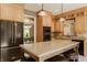 Spacious kitchen with a large center island, stainless steel appliances, and custom cabinetry at 269 Manchester Ct, Noblesville, IN 46060