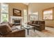 Inviting living room with fireplace, plush sofas, and open layout, great for entertaining at 269 Manchester Ct, Noblesville, IN 46060