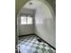 Roomy vintage-style kitchen with tiled archways and natural light at 302 E Main St, Greenfield, IN 46140