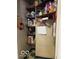 Walk-in pantry offers plenty of room for food storage with shelving at 302 E Main St, Greenfield, IN 46140