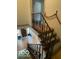 Staircase with unique wrought iron railing and rope accent at 302 E Main St, Greenfield, IN 46140