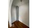 A walk-in storage space featuring hardwood floors and a wall-mounted light fixture at 302 E Main St, Greenfield, IN 46140