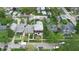 An aerial view of a neighborhood with green lawns and tree-lined streets at 319 N Ridgeview Dr, Indianapolis, IN 46219