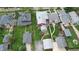 The neighborhood has a dense canopy of trees and large lots of grass at 319 N Ridgeview Dr, Indianapolis, IN 46219