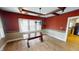 Bright dining room with hardwood floors, chandelier, and windows providing ample natural light at 319 N Ridgeview Dr, Indianapolis, IN 46219