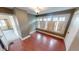Cozy living room with warm wood floors and window shutters at 319 N Ridgeview Dr, Indianapolis, IN 46219