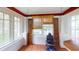 Bright sunroom with large windows, offering a relaxing space with natural light and views at 319 N Ridgeview Dr, Indianapolis, IN 46219