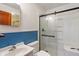 Bathroom featuring a vanity and glass shower doors at 327 S Biltmore Ave, Indianapolis, IN 46241