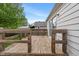 View of the home's wooden backyard deck at 327 S Biltmore Ave, Indianapolis, IN 46241