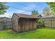 View of a wooden shed in the backyard of the home at 327 S Biltmore Ave, Indianapolis, IN 46241