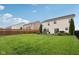Expansive backyard features a patio, grill, and a beautifully maintained lawn, great for relaxation at 3430 Burlingame Blvd, Westfield, IN 46074