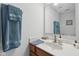 Bathroom vanity with a sink, a mirror, and decor, providing an inviting space to get ready at 3430 Burlingame Blvd, Westfield, IN 46074