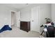 Bedroom with a dresser, doors, and carpeted floor at 3430 Burlingame Blvd, Westfield, IN 46074