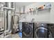 Laundry room featuring a washer, dryer, and water heater at 3430 Burlingame Blvd, Westfield, IN 46074