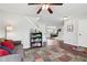 Cozy living room with wood floors and staircase at 3430 Burlingame Blvd, Westfield, IN 46074