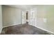 Bedroom with neutral carpet and closet provides ample storage and organization at 3511 N Keystone Ave, Indianapolis, IN 46218