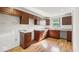 Spacious kitchen with hardwood floor, abundant storage, and natural light from the window at 3511 N Keystone Ave, Indianapolis, IN 46218