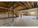 Spacious unfinished basement offering potential with exposed beams and concrete floor at 3678 Sugar Pine Ln, Zionsville, IN 46077