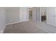 Neutral carpeted bedroom with ensuite bathroom access offers convenience and privacy for relaxation at 3678 Sugar Pine Ln, Zionsville, IN 46077