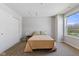 Bedroom with window and neutral walls features carpet, ample natural light and a large closet at 3678 Sugar Pine Ln, Zionsville, IN 46077